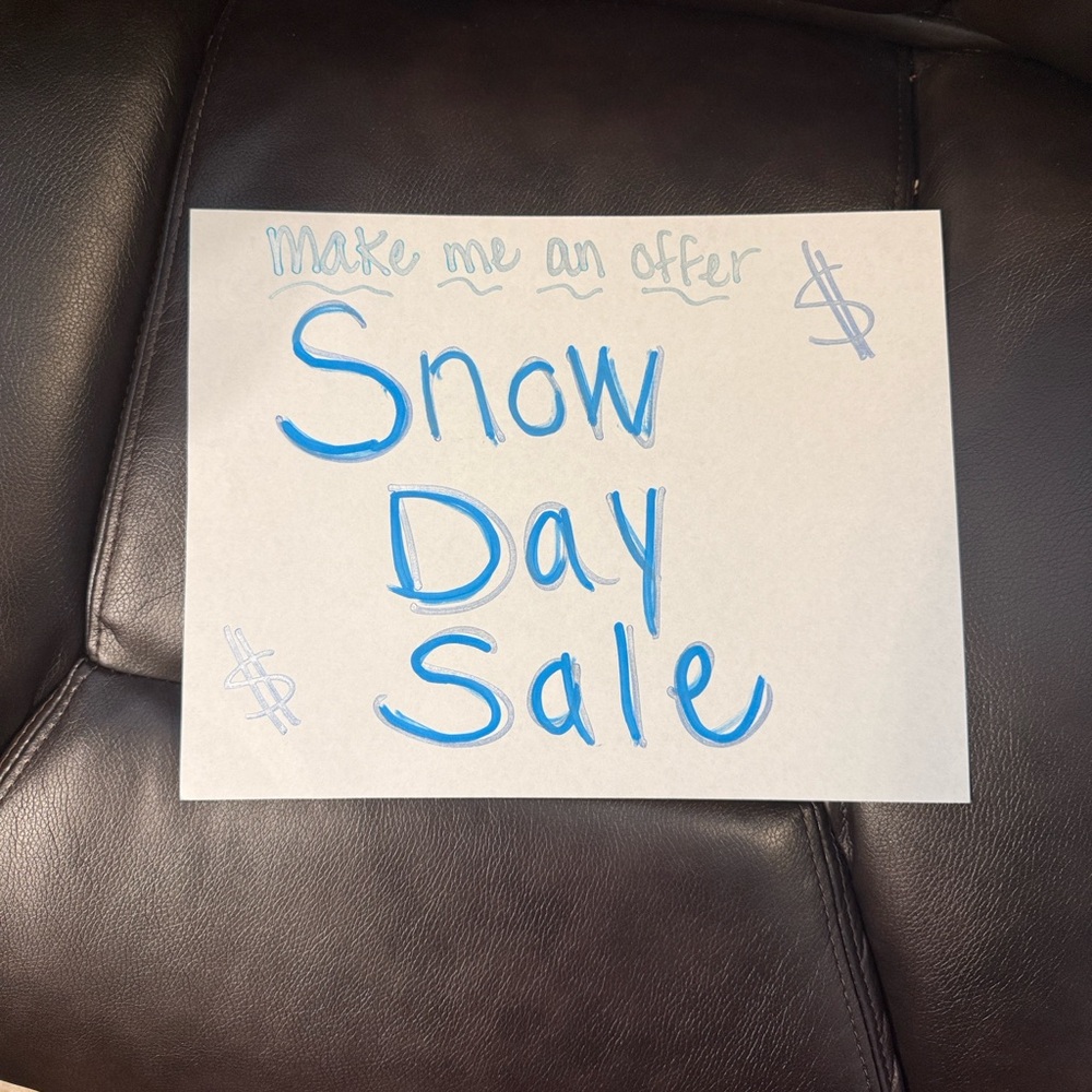 Blue Handwritten 'Snow Day Sale' Sign
